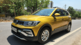 Used Volkswagen Taigun Highline AT SUV in Noida - 53,000 km, priced at ₹12,95,000.